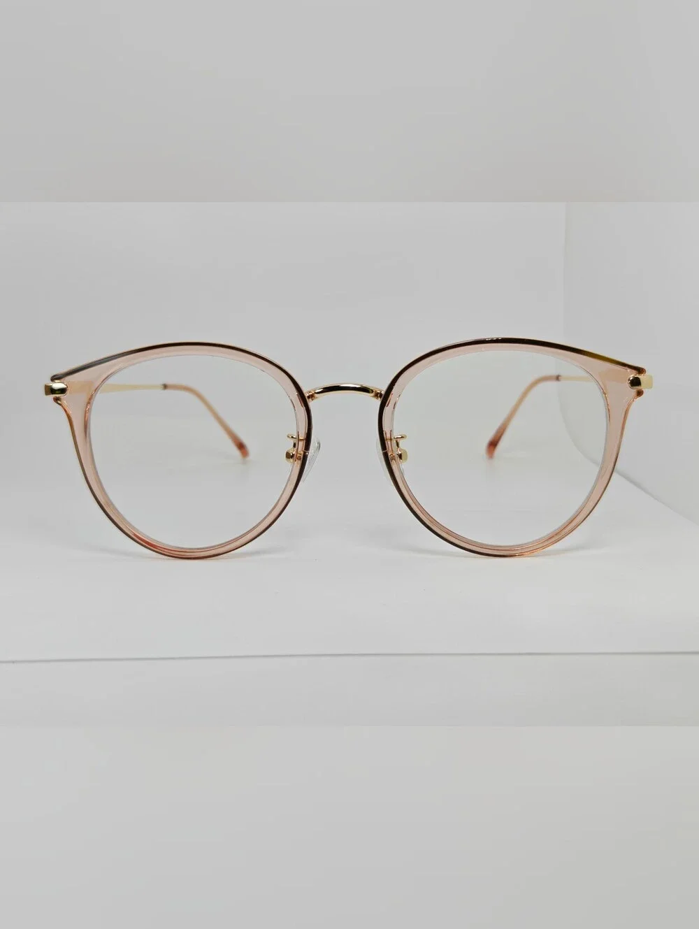 Hollie. Transparent Pink Round Women's Eyeglasses with Gold Bridge